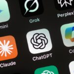Apple iPhone screen with Artificial Intelligence icons.