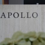 Apollo Global Management signage in New York, US, on Tuesday, Dec. 5, 2023. Apollo's CEO said it's getting harder for active managers to beat indexes in public markets and that it is easier for investors to find alpha in private markets. Photographer: Jeenah Moon/Bloomberg via Getty Images