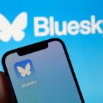 The image shows the icon of Bluesky, the new decentralized social network created by Twitter co-founder Jack Dorsey.