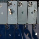 Broken iPhones are seen as a part of replica of Formula E car made by used electronics, on the opening day of the United Nations Climate Change Conference COP28 in Dubai, United Arab Emirates on November 30, 2023.