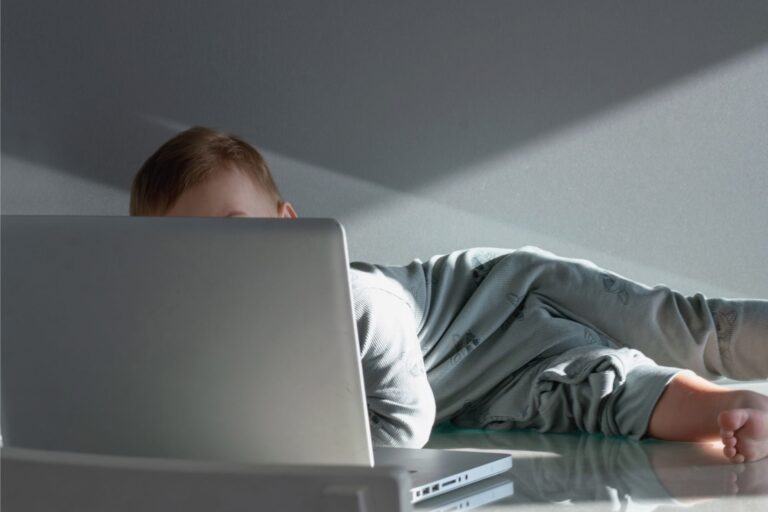 A child with a laptop.