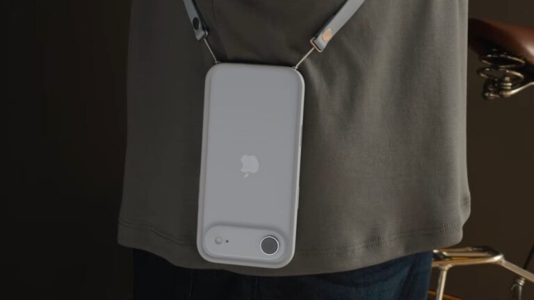 iPhone hanging from Apple Crossbody Strap