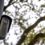 A Flock surveillance camera in Houston, Texas, US, on Wednesday, Feb. 4, 2026. Flock counts more than 6,000 customers that are using its license plate readers, camera-equipped drones, gunshot detection devices and software, with customers in every state except Alaska. Photographer: Antranik Tavitian/Bloomberg via Getty Images