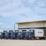 Gatik trucks backed up to loading bays