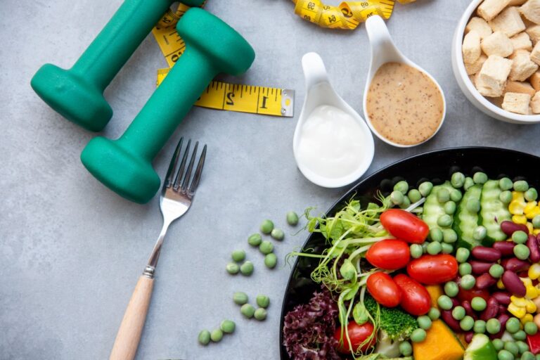 healthy food and hand weights