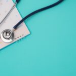 Stethoscope and a calendar. Doctor's appointment and service in the hospital.
