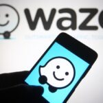 In this photo illustration a Waze logo of a GPS navigation