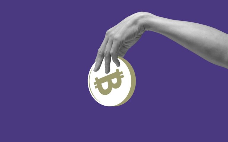 Hand holding a large abstract bitcoin against a purple backdrop, used in a post about Zipmex