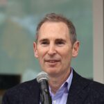 Andy Jassy, the CEO of Amazon, speaks at the ceremonial ribbon cutting prior to tomorrow's opening night for the NHL's newest hockey franchise the Seattle Kraken at the Climate Pledge Arena on October 22, 2021 in Seattle, Washington