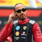 NORTHAMPTON, ENGLAND - JULY 06: Lewis Hamilton of Great Britain and Scuderia Ferrari looks on, on the grid during the F1 Grand Prix of Great Britain at Silverstone Circuit on July 06, 2025 in Northampton, England. (Photo by Bryn Lennon - Formula 1/Formula 1 via Getty Images)