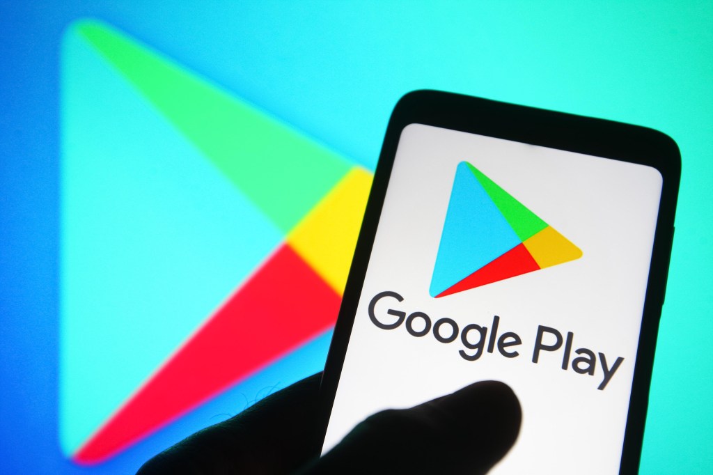 In this photo illustration a Google Play Store logo is seen on a smartphone.
