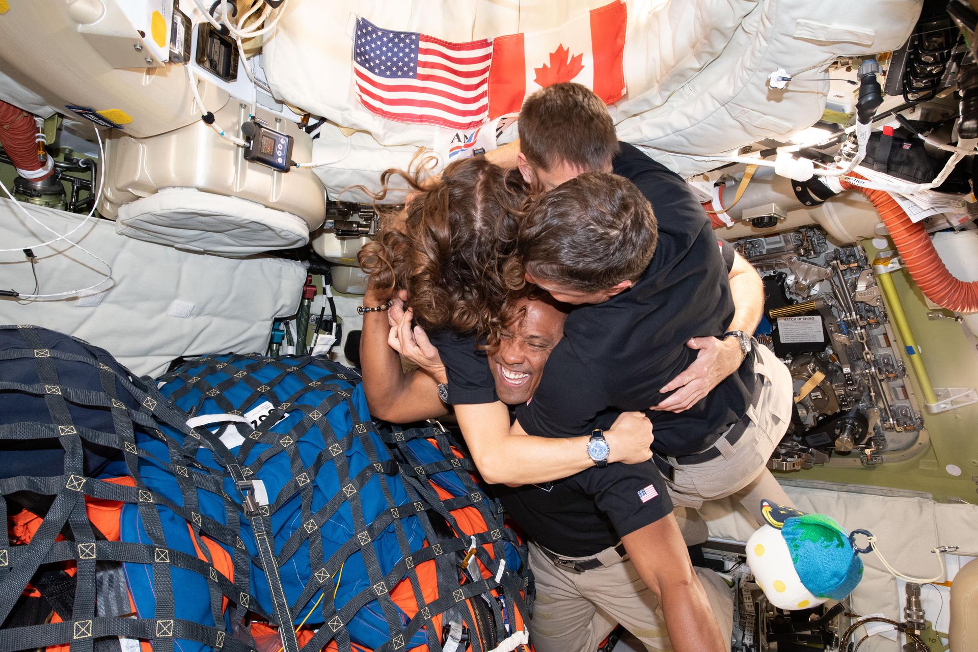 gsf-artemis-2-image-3 The Artemis 2 astronauts hugging each other inside the Orion spacecraft