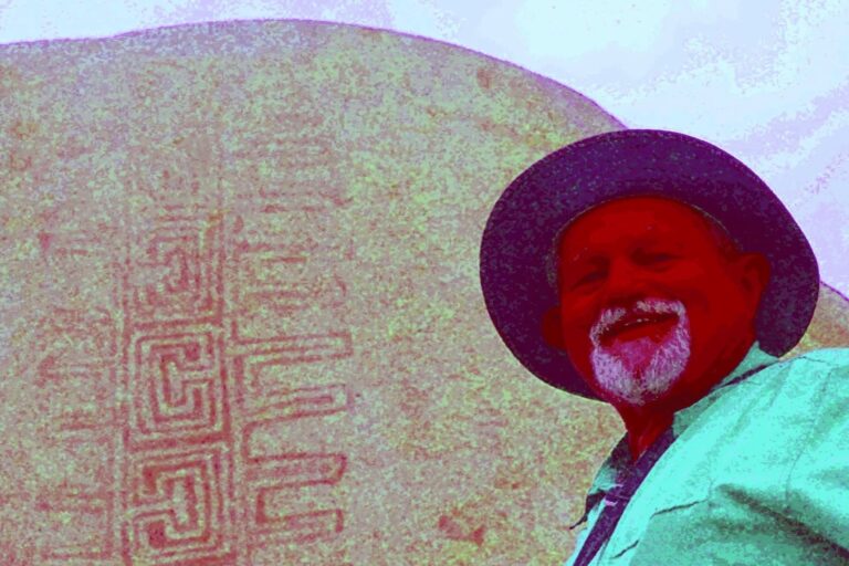 Harman poses in front of an example of the Rancho Bernardo style of Native American artwork.