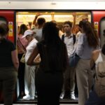 Commuters travel on a London Underground tube carriage, during a heatwave, in central London on June 24, 2026.