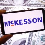 mckesson logo on a background featuring cash notes
