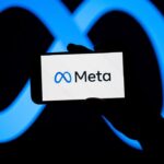 The Meta Platforms, Inc. logo is seen on a smartphone screen.