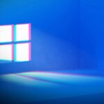 Windows logo on a dark blue background.