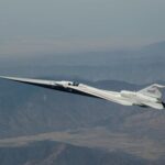 NASA’s X-59 quiet supersonic research aircraft flies above the Mojave Desert in California on Tuesday, Aug. 18, 2026.