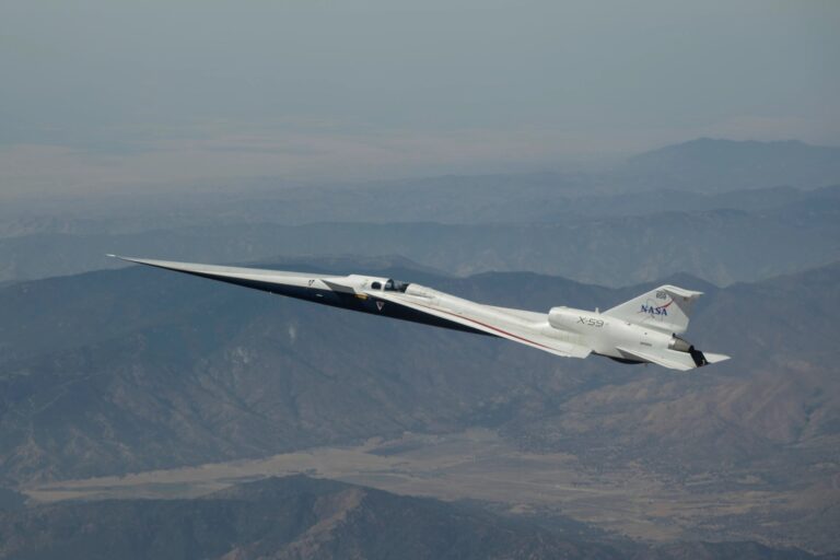NASA’s X-59 quiet supersonic research aircraft flies above the Mojave Desert in California on Tuesday, Aug. 18, 2026.