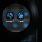 This photograph shows the app logos of artificial intelligence (AI) assistants ChatGPT and Claude on a smartphone's screen.