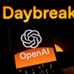 The OpenAI logo is displayed on a smartphone screen held in one hand, with the Daybreak visual in the background.