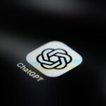 The ChatGPT application icon is displayed on a smartphone screen.