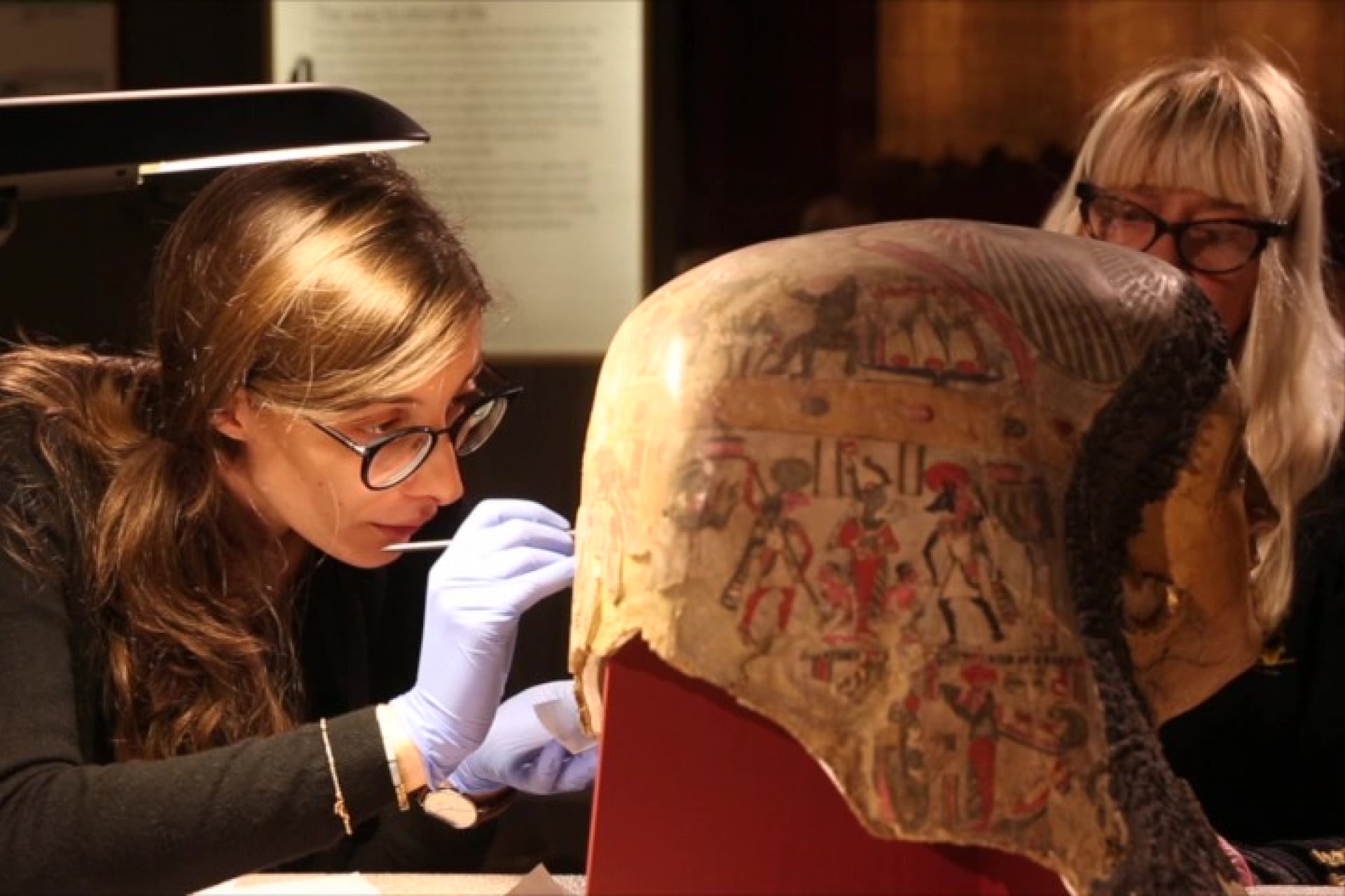 Clara Granzotto taking a micro-sample for proteomics analysis from the painted surface of Mummy mask of a woman.