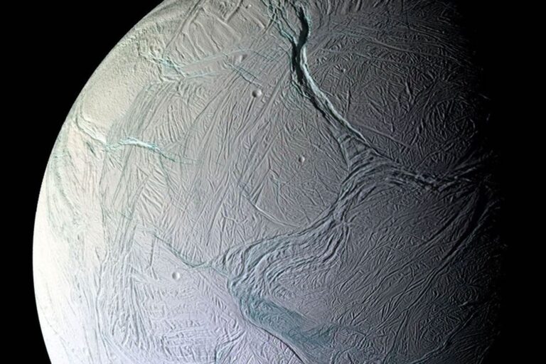 NASA's Cassini spacecraft discovered that Enceladus emits icy water particles and gas from its surface at approximately 800 miles per hour (400 meters per second).