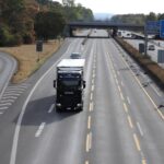 A truck is traveling on Highway 4 near the Cologne-Heumar interchange.
