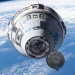 Boeing's CST-100 Starliner crew ship approaches the International Space Station on the company's Orbital Flight Test-2 mission on May 20, 2022.