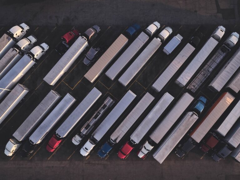 overhead shot of parked semi trucks