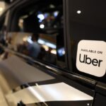 Uber sticker on car window