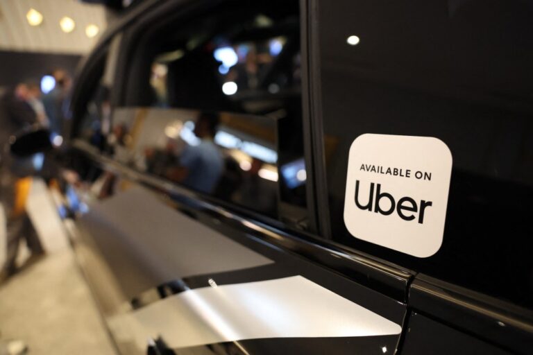 Uber sticker on car window