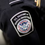 MIAMI, FL - MARCH 04: A U.S. Customs and Border Protection officer's patch is seen as they unveil a new mobile app for international travelers arriving at Miami International Airport on March 4, 2015 in Miami, Florida. Miami-Dade Aviation Department and U.S. Customs and Border Protection (CBP) unveiled a new mobile app for expedited passport and customs screening. The app for iOS and Android devices allows U.S. citizens and some Canadian citizens to enter and submit their passport and customs declaration information using their smartphone or tablet and to help avoid the long waits in the exit lanes. (Photo by Joe Raedle/Getty Images)