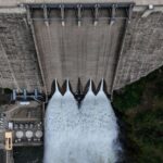 Water rushes out of Pine Flat Dam.
