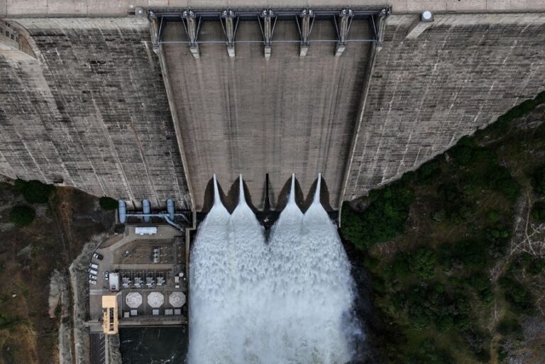 Water rushes out of Pine Flat Dam.