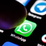 The Whatsapp app logo can be seen on the display of a smartphone on September 2, 2025.