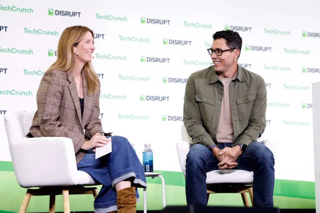 SAN FRANCISCO, CALIFORNIA - OCTOBER 13: (L-R) Kirsten Korosec and RJ Scaringe, Founder & CEO, Rivian, speak onstage during TechCrunch Disrupt 2026 at Moscone Center on October 13, 2026 in San Francisco, California. (Photo by Kimberly White/Getty Images for TechCrunch)