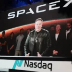 Elon Musk, founder and CEO of SpaceX, speaks via video before the ringing of opening bell at the Nasdaq Marketsite at the launch of the company's initial public offering (IPO) on June 12, 2026