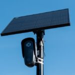 Flock license plate reader and camera with solar panel against a blue sky, Pleasant Hill, California, April 16, 2026.