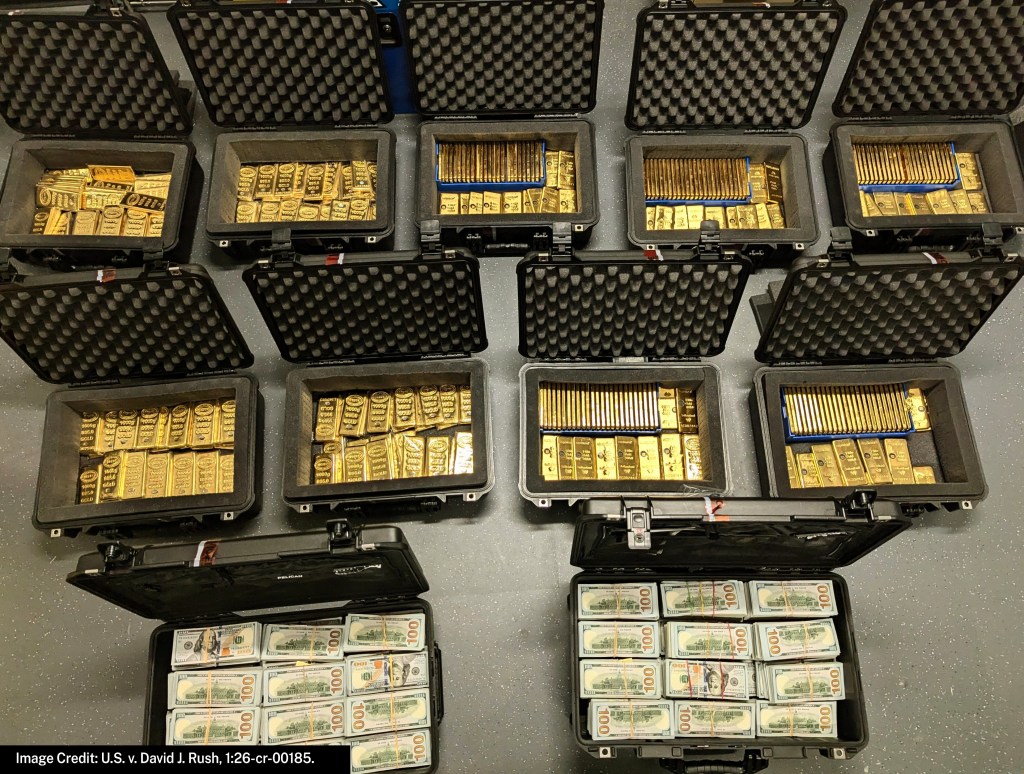 nine suitcases full of gold bars, and two suitcases full of 100-dollar cash bills, as a photo taken from above.
