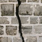big crack in brick wall