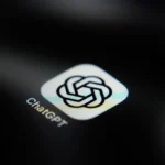 The ChatGPT application icon is displayed on a smartphone screen.