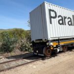 An autonomous rail vehicle moves down the track.