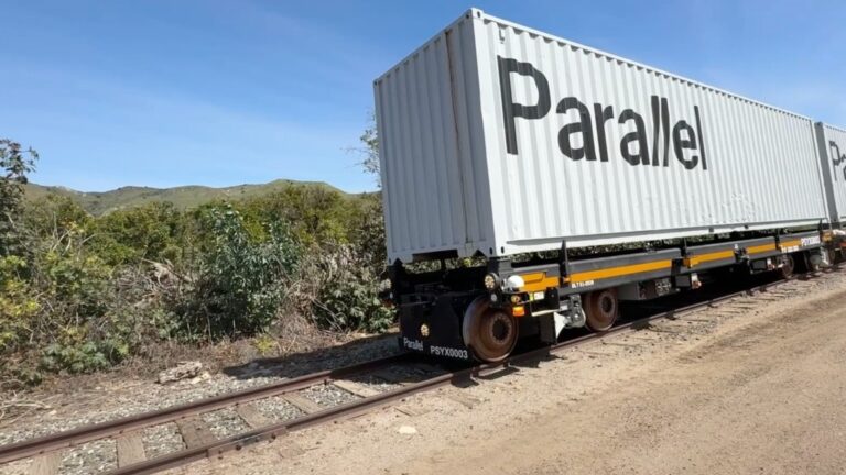 An autonomous rail vehicle moves down the track.
