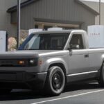 Slate Auto's Blank Slate truck charging at a Tesla Supercharger